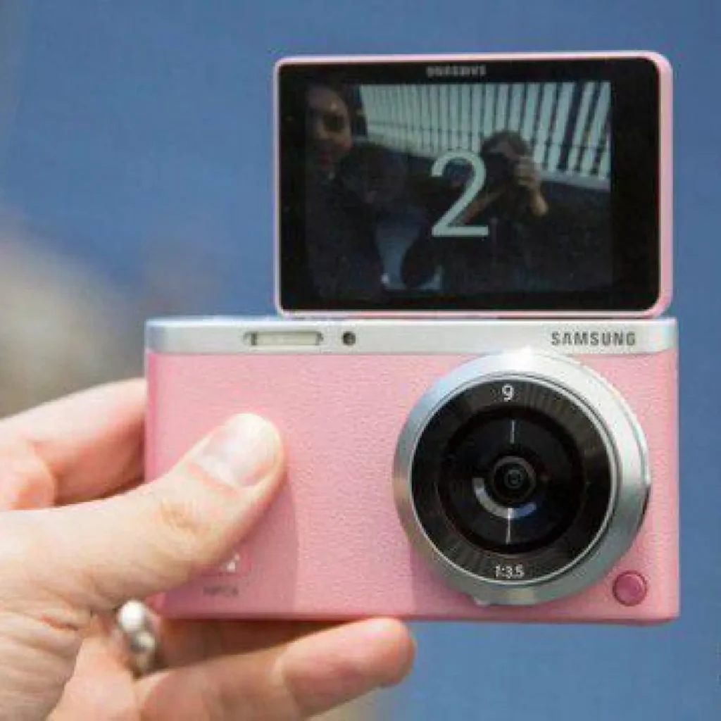 Samsung NX mini 20.5MP with NX-M 9mm F/3.5 Lens.